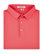 Sullivan Polo in Shine, folded bright coral performance golf polo