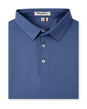 A folded blue polo shirt with a classic collar and three-button placket. The brand label 'Slightly Down' is visible inside the collar.