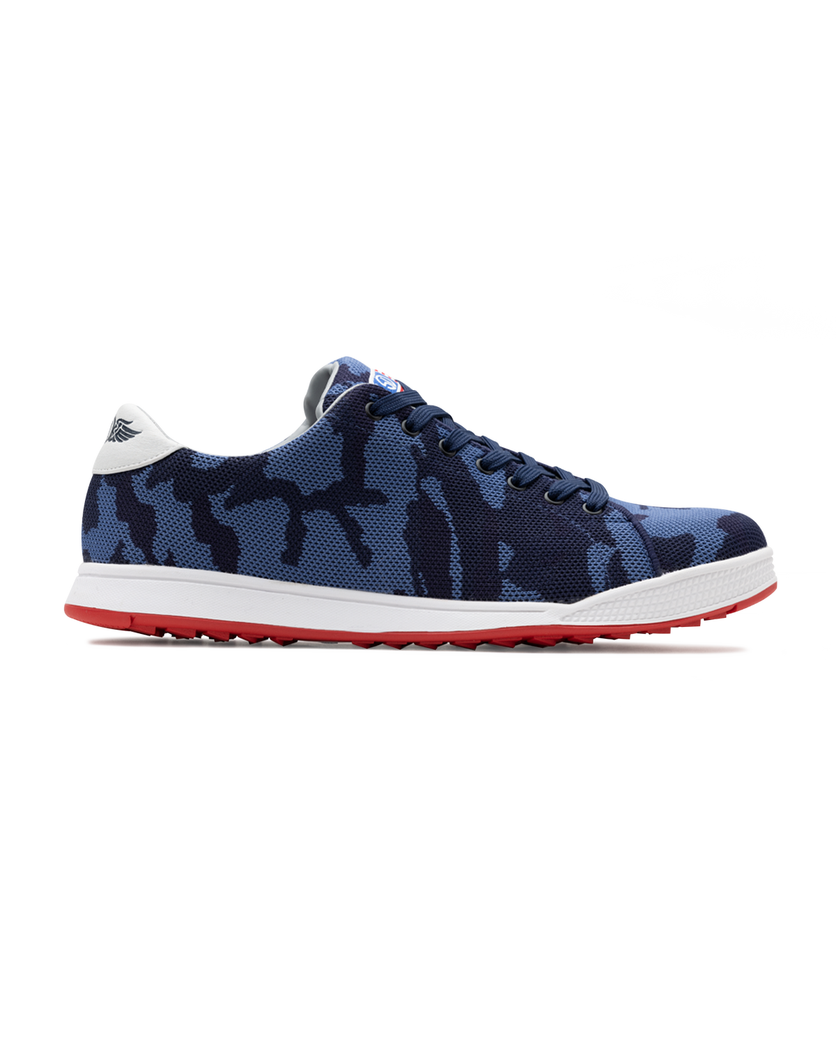 Men's Field V2 Shoe in Camo Indigo, lateral side view featuring a knit mesh upper with a navy and blue camouflage pattern, lace-up closure, white midsole, and red outsole with Straight Down logo heel tab