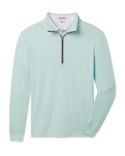 Crusher Quarter Zip in Mint Tea with a stand collar, contrasting dark zipper and long sleeves.