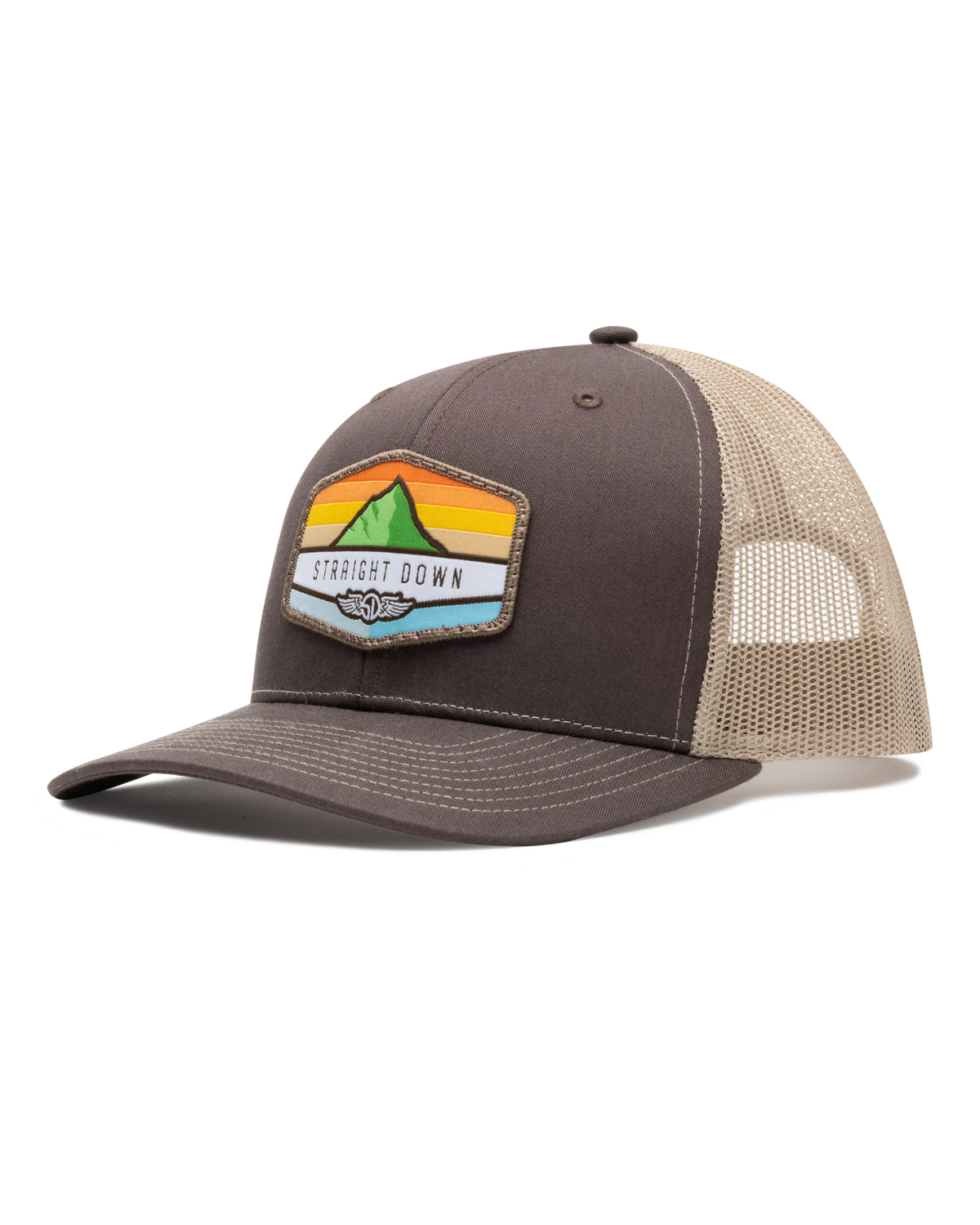 El Toro Hat in Brown, side view featuring a brown structured trucker cap with a woven mountain sunset landscape patch and Straight Down logo on the front panel, with tan mesh back panels and tan contrast stitching on the brim