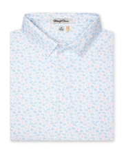 Men's Turtle Island Polo in Coastal, folded flat lay front view featuring a white short sleeve polo with an allover sea turtle and coral print in light blue and pink tones