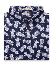 Men's Pineapple Express Polo in New Indigo, folded flat lay front view featuring a navy and white pineapple print with wood buttons