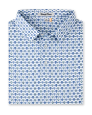 Day of the Dead Polo in Herb featuring an all-over blue and green sugar skull print with a classic polo collar and button placket.