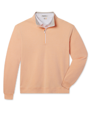 Glendale Quarter Zip in Cantaloupe featuring a soft peach-orange finish, stand collar, quarter-zip closure, and banded cuffs and hem.