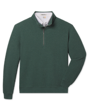 A dark green waffle-knit quarter-zip pullover sweater with a white polo underneath.
