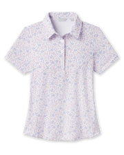 Front product view of the Wonderland Polo in White showcasing a floral print