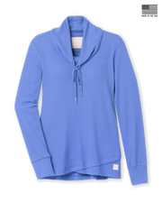 Women's Misty Top in Blueberry, flat lay front view featuring solid medium blue waffle knit fabric, shawl collar with drawstring tie, long sleeves with ribbed cuffs, crossover hem, and Straight Down logo patch at the hip