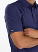 Close-up detail of Dodge Polo in Dark Indigo showing sleeve logo, collar, and fabric texture