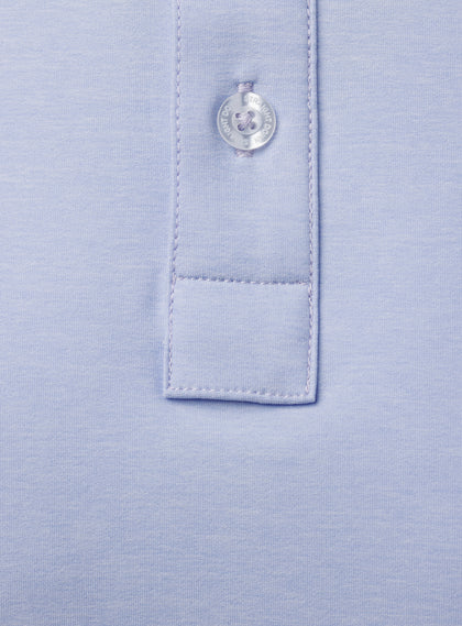 Close-up detail of Dodge Polo in Lavender showing button placket and fabric texture