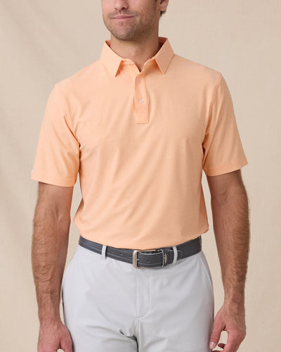 Dodge Polo in Cantalope Orange, model wearing front view
