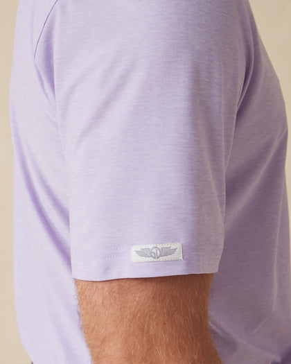 Close-up sleeve detail of Dodge Polo in Violet with woven logo tab
