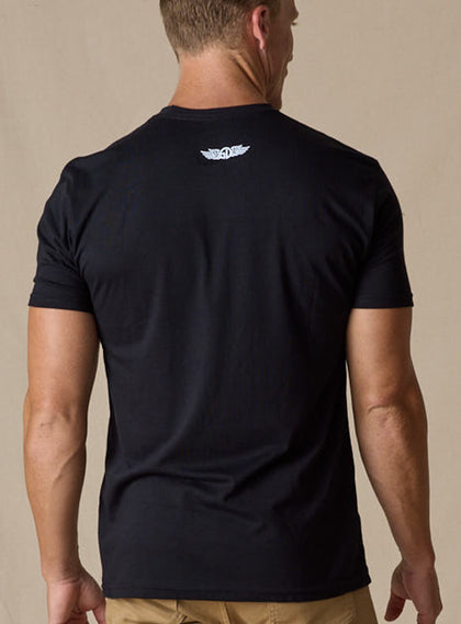 Straight Down Landscape Tee in Black, on model back view showing black body with Straight Down wings logo at upper back