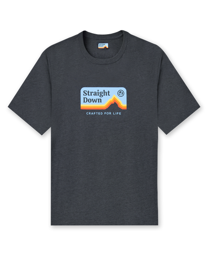 Straight Down Starsky Tee in Charcoal, flat lay front view showing charcoal heather crew neck body with retro mountain graphic featuring blue sky, orange and red layered peaks, Straight Down logo, and Crafted for Life text