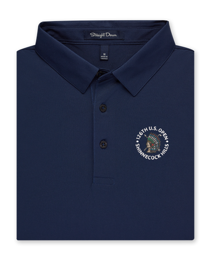 Men’s Sullivan Polo in new indigo with 126th U.S. Open Shinnecock Hills logo, folded front view