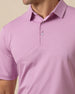 Close-up of men’s haze pink/purple polo shirt showing collar, and button placket