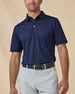 Men’s Sullivan Polo in New Indigo styled with khaki golf pants, front view