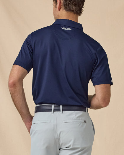 Back view of the Sullivan Polo in New Indigo with signature logo detail below the collar