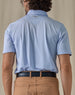 Men’s Sullivan Polo in Powder Blue, back view worn with khaki pants