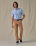 Men’s Sullivan Polo in Powder Blue, full-body styling view with khaki pants and dark sneakers