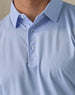 Men’s Sullivan Polo in Powder Blue, close-up detail view of collar and button placket