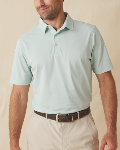Men’s Sullivan Polo in celery green worn with khaki shorts, front view