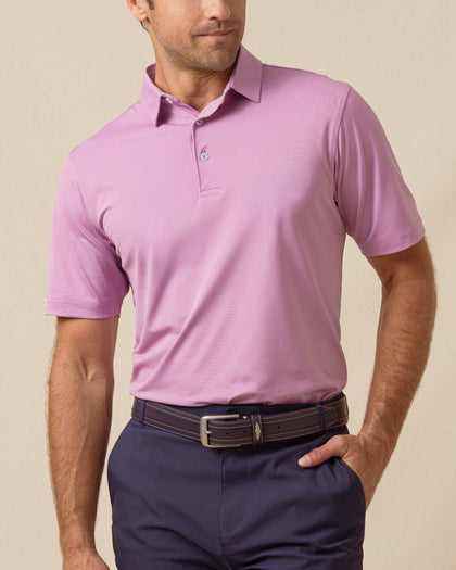 Men’s haze pink/purple short-sleeve performance polo shirt with a two-button placket and smooth, lightweight fabric