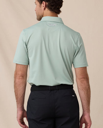 Sullivan Polo in Herb Green, back view with embroidered logo detail