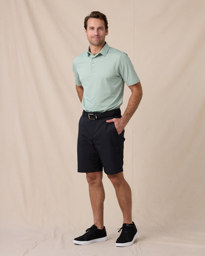 Sullivan Polo in Herb Green with black golf pants, full outfit model view