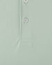 Close-up of light green golf polo fabric with button placket detail
