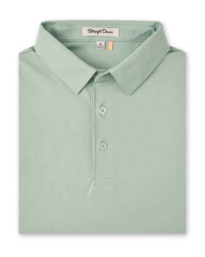 Men’s light green golf polo shirt folded with classic collar and button placket