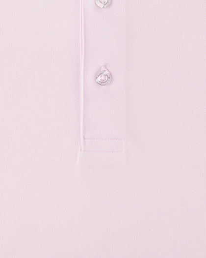 Close-up of the Sullivan Polo in Lilac highlighting the lightweight performance fabric texture, button placket, and soft pastel color