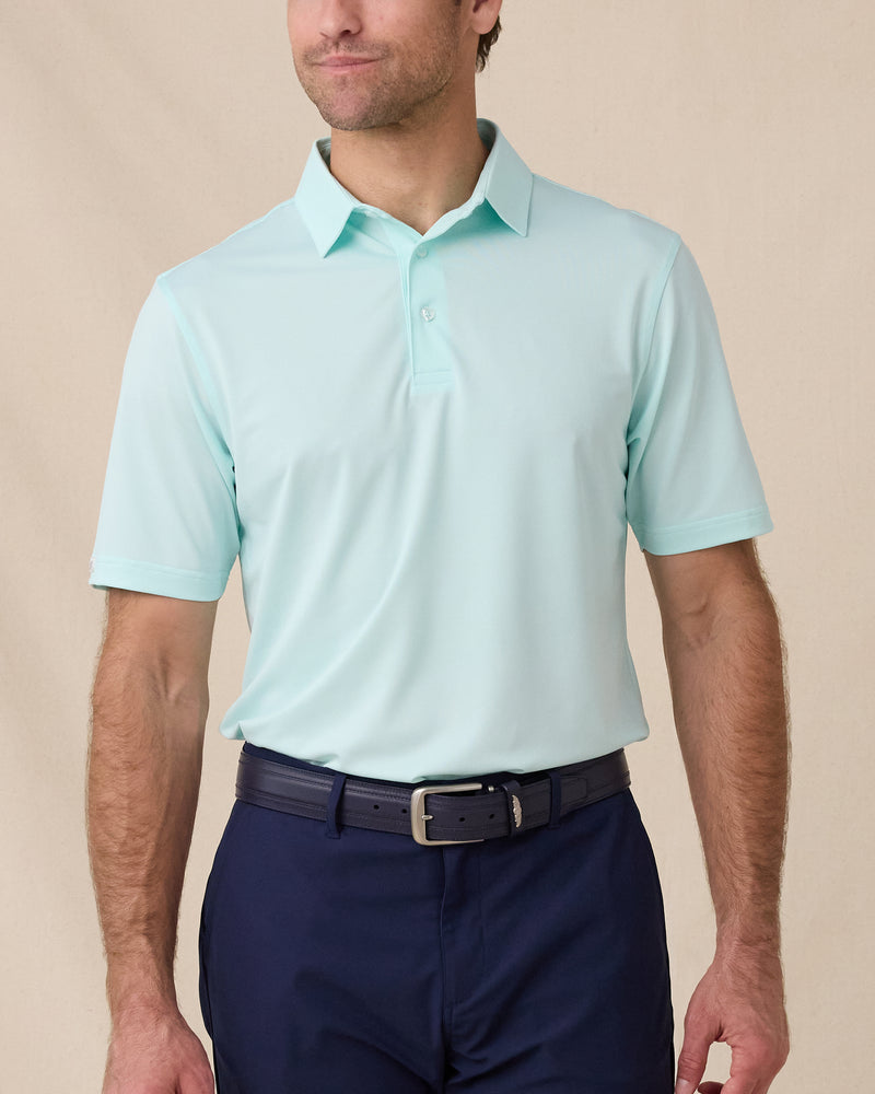 Sullivan Polo in Mint Tea worn with navy golf shorts, front model view