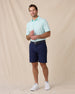Sullivan Polo in Mint Tea with navy golf shorts, full outfit model view