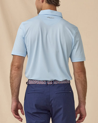 Sullivan Polo in Nantucket blue, back view paired with navy shorts