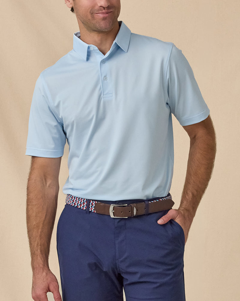 Sullivan Polo in Nantucket blue, front model view with navy shorts and woven belt