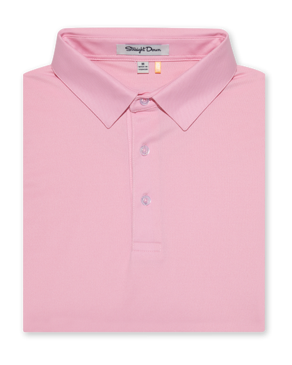 Folded men’s pink performance polo with classic collar and button placket