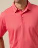 Sullivan Polo in Shine with solid bright coral fabric, collar detail view