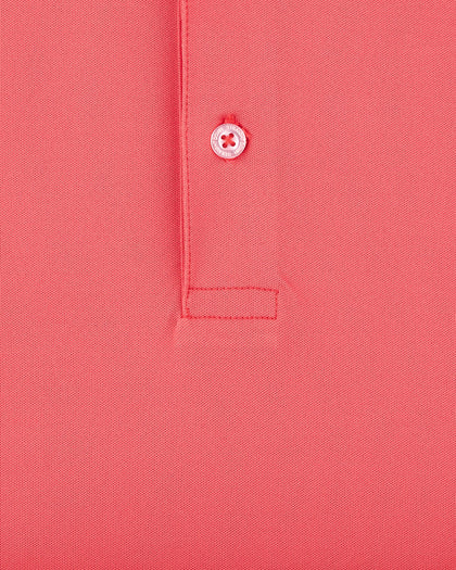 Sullivan Polo in Shine with textured bright coral fabric, close-up detail view