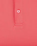 Sullivan Polo in Shine with textured bright coral fabric, close-up detail view