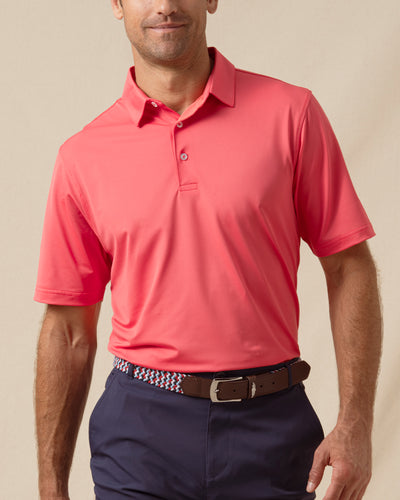 Sullivan Polo in Shine worn with navy golf pants, front model view