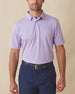 Men’s Sullivan Polo in violet worn with navy shorts, front view