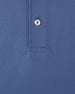 Close-up of a blue polo shirt showing the collar area with a single white button and a stitched pocket detail.