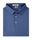 A folded blue polo shirt with a classic collar and three-button placket. The brand label 'Slightly Down' is visible inside the collar.