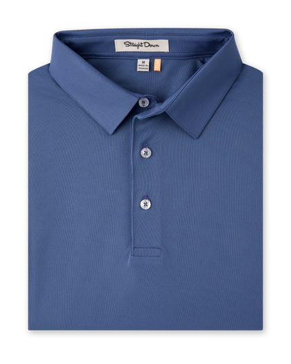 A folded blue polo shirt with a classic collar and three-button placket. The brand label 'Slightly Down' is visible inside the collar.