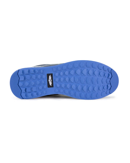 Men's Field V2 Shoe in Camo Carbon, bottom view featuring a blue traction outsole with a black SD logo label