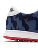 Men's Field V2 Shoe in Camo Indigo, close-up heel view featuring a navy and blue camo print breathable mesh upper with a white leather heel collar and embossed wing logo detail