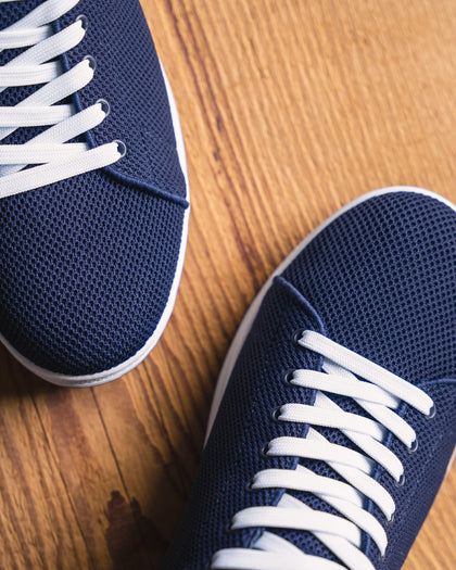 Men's Field V2 Shoe in Indigo, close-up front detail view of both shoes featuring the navy mesh knit upper and white laces