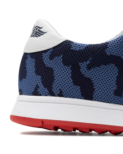 Men's Field V2 Shoe in Camo Indigo, close-up heel view featuring a navy and blue camo print breathable mesh upper with a white leather heel collar and embossed wing logo detail