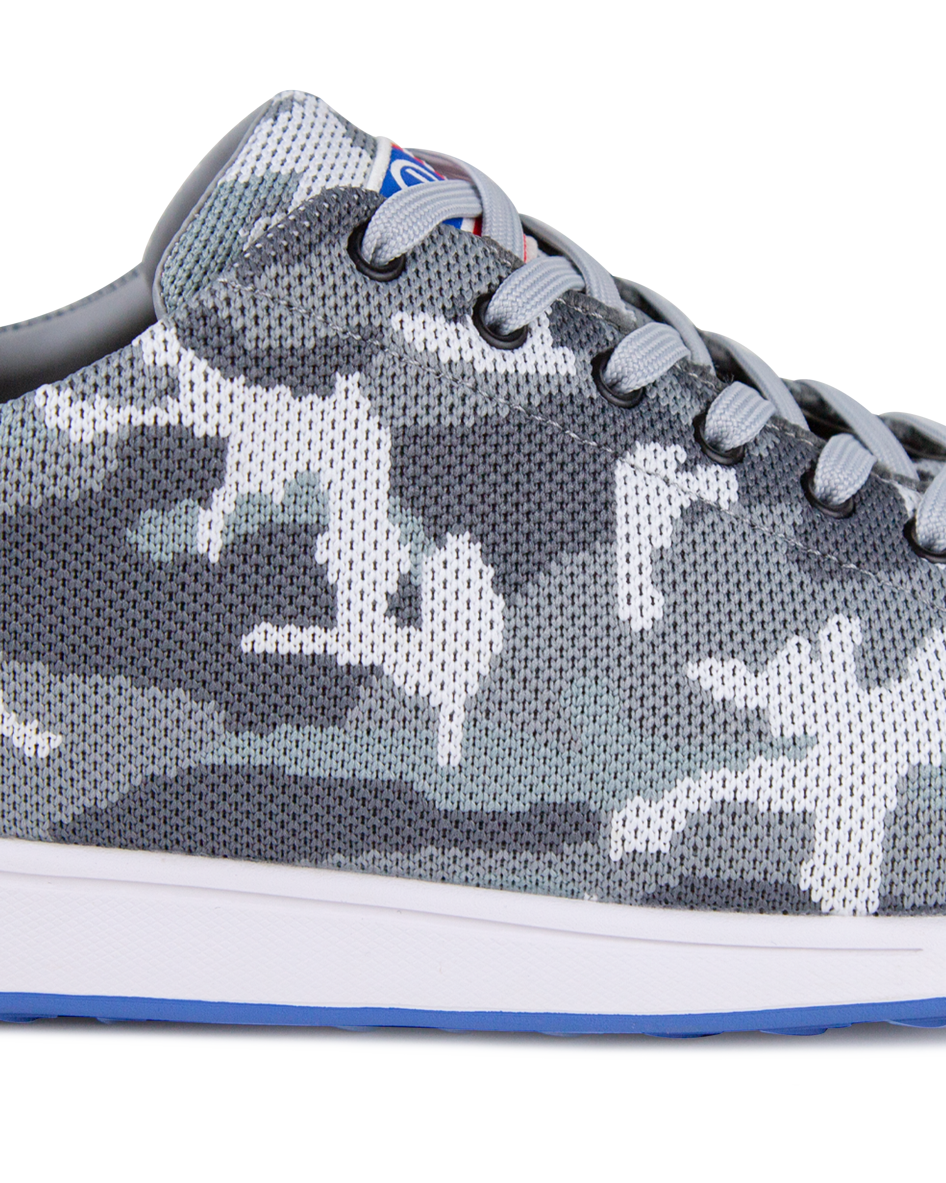 Men's Field V2 Shoe in Camo Carbon, close-up side detail view featuring the gray camo knit upper, gray laces, and white midsole with blue outsole